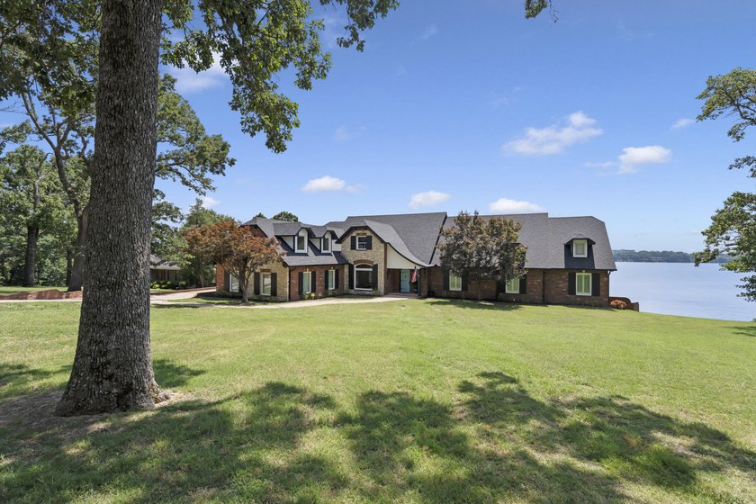 Few homes on Grand Lake offer a setting like this. Positioned on - photo 3