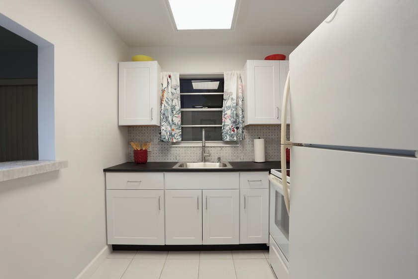 Owner financing available! Move-in ready! Sparkling clean - photo 11