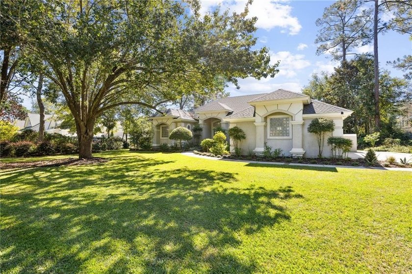 THIS BEAUTIFULLY UPDATED THREE-BEDROOM HOME IN OSPREY COVE IS - photo 5