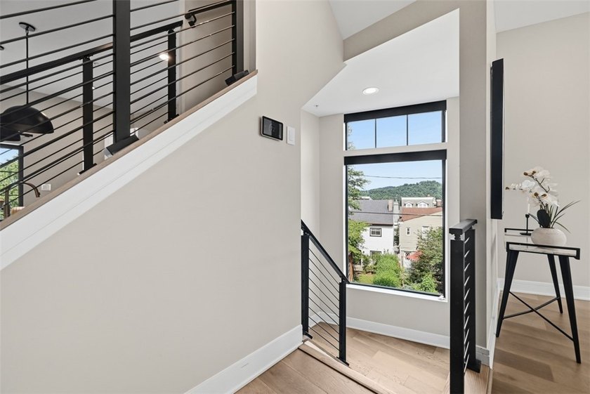 Welcome to 724 52nd Street, a striking free-standing modern - photo 6