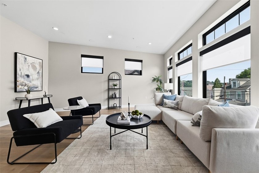 Welcome to 724 52nd Street, a striking free-standing modern - photo 9