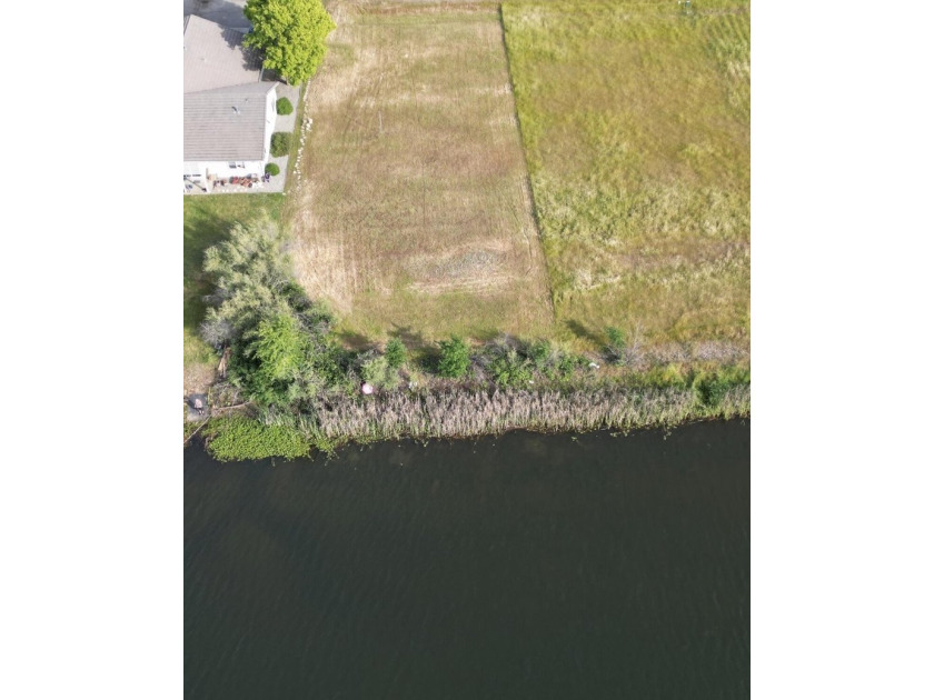 Build your dream home on the water in the gated community of - photo 10
