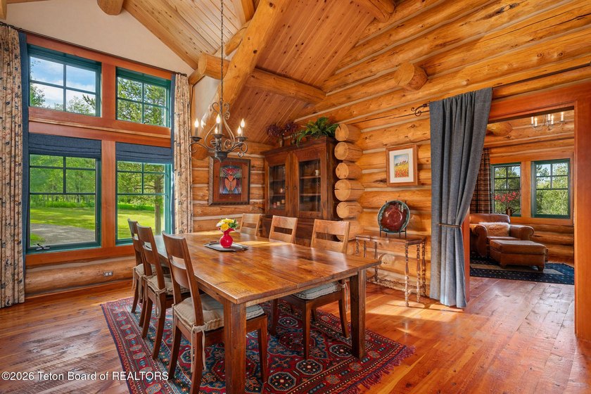 Set on 7.24 private acres bordering Bridger-Teton National - photo 9