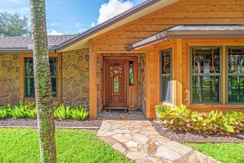 Welcome Home Welcome home to this rustic estate retreat set on 5 - photo 3