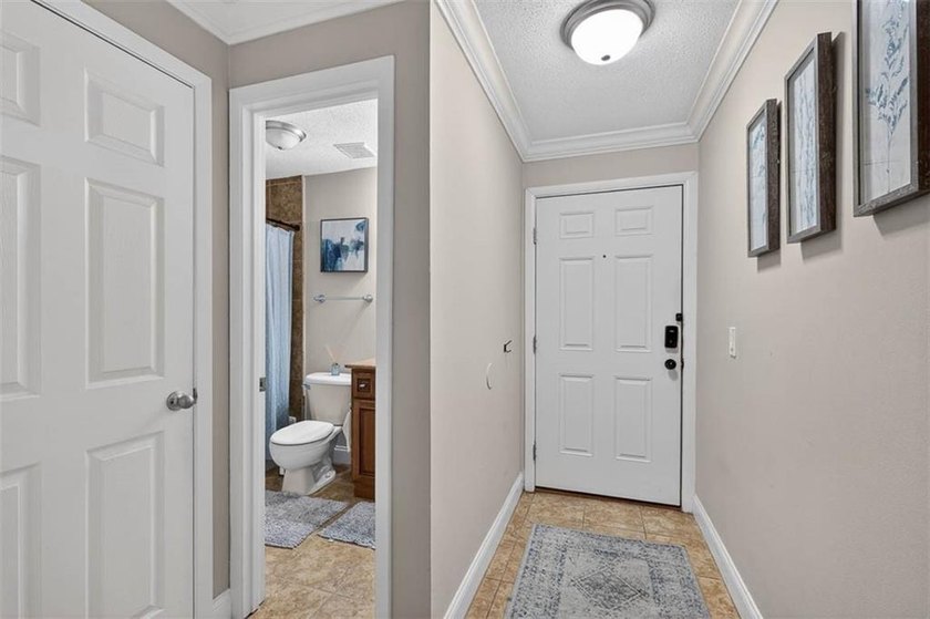 Move-in ready and located within a sought-after gated community - photo 3