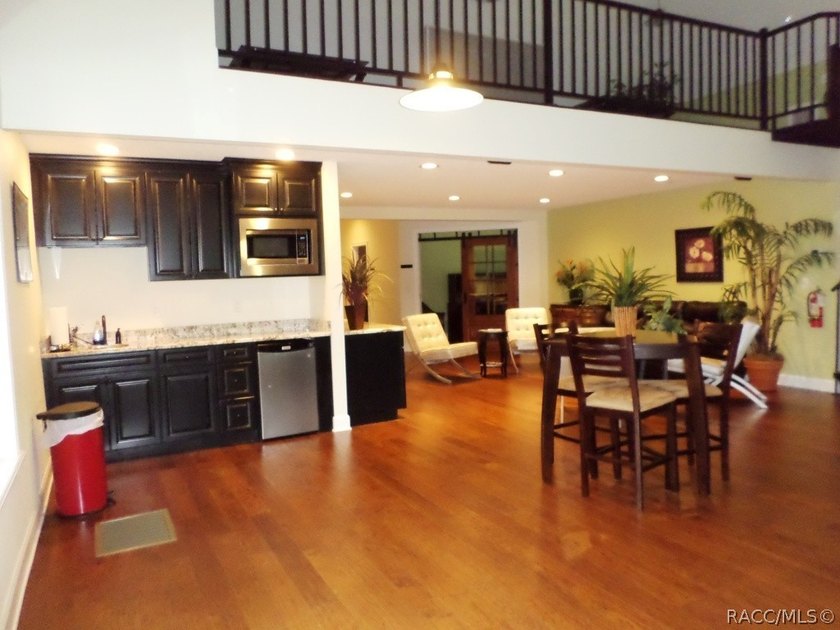 Situated centrally within the Rainbow Springs Community, this - photo 13