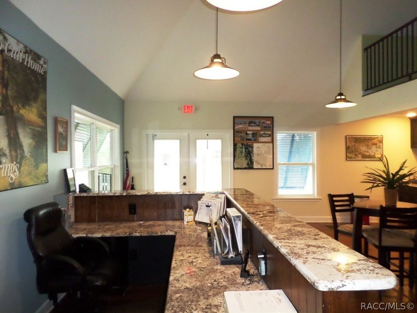Situated centrally within the Rainbow Springs Community, this - photo 16