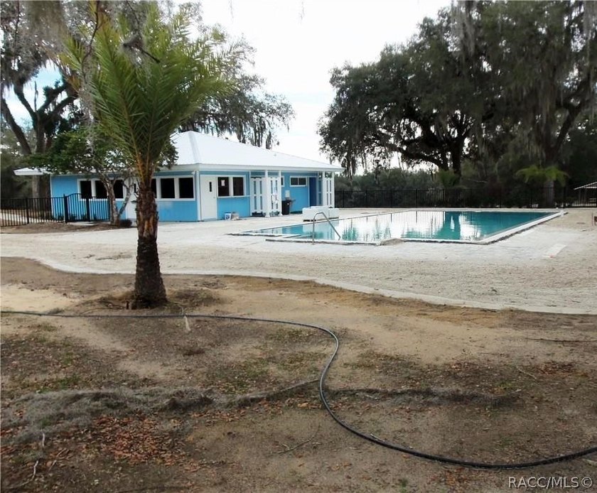 Situated centrally within the Rainbow Springs Community, this - photo 20