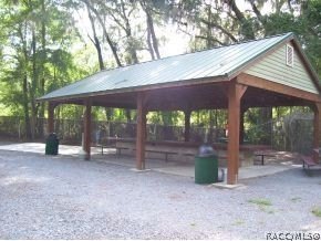 Situated centrally within the Rainbow Springs Community, this - photo 27