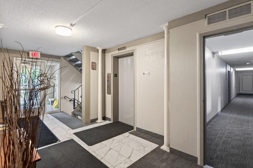 Welcome to this stylish and conveniently located condo in the - photo 3