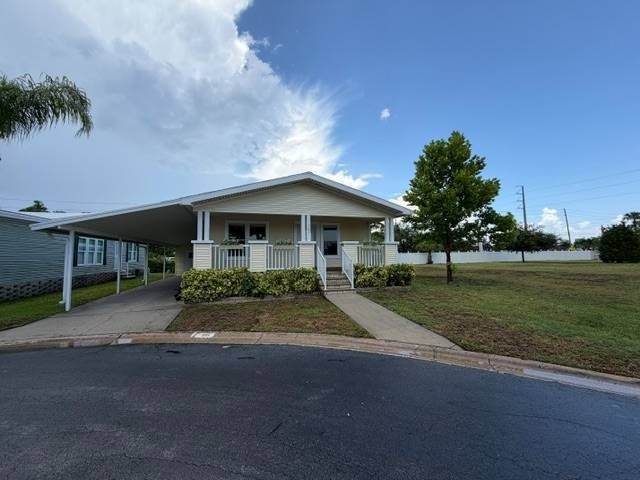 Welcome home to this beautifully updated 2006 Palm Harbor - photo 4