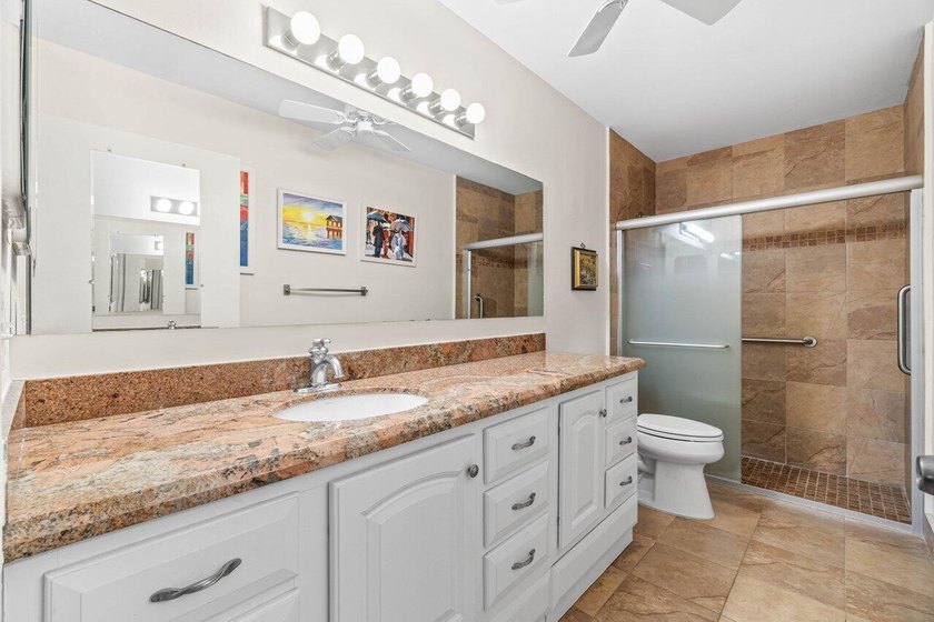 Lovely 2 beds/2 bath villa in beautiful gated 55+ Whisper Walk! - photo 18