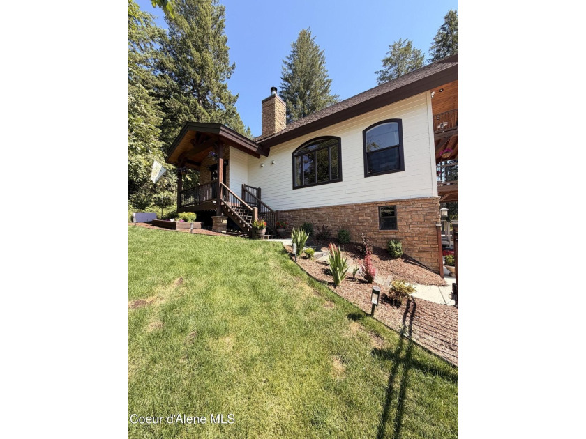 Welcome to your mountain escape in scenic Sagle, Idaho! This - photo 2