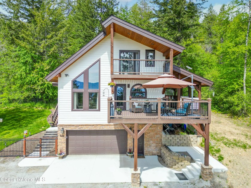 Welcome to your mountain escape in scenic Sagle, Idaho! This - photo 8