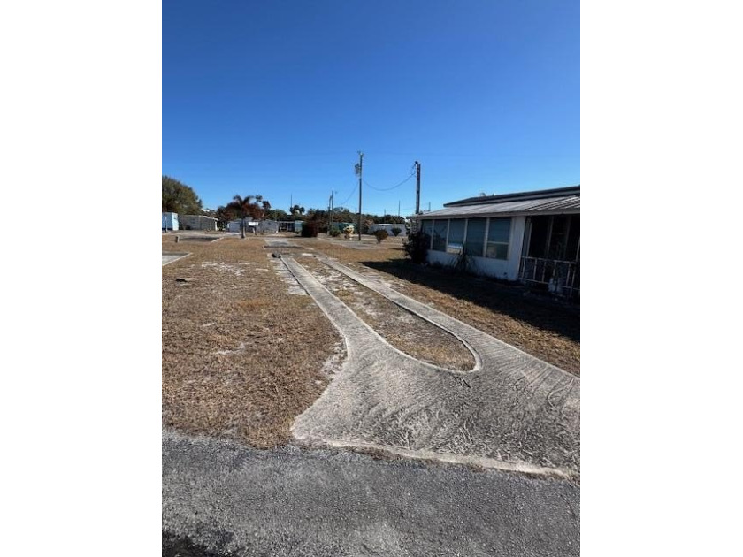 55 + CO-OP Community, Whispering Creek. Vacant Lot...Ready for - photo 2