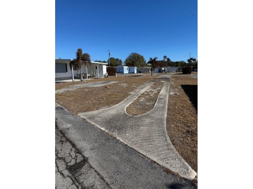 55 + CO-OP Community, Whispering Creek. Vacant Lot...Ready for - photo 3