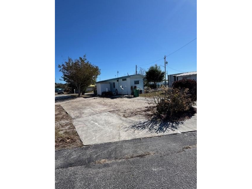 55 + CO-OP Community, Whispering Creek. Vacant Lot...Ready for - photo 5