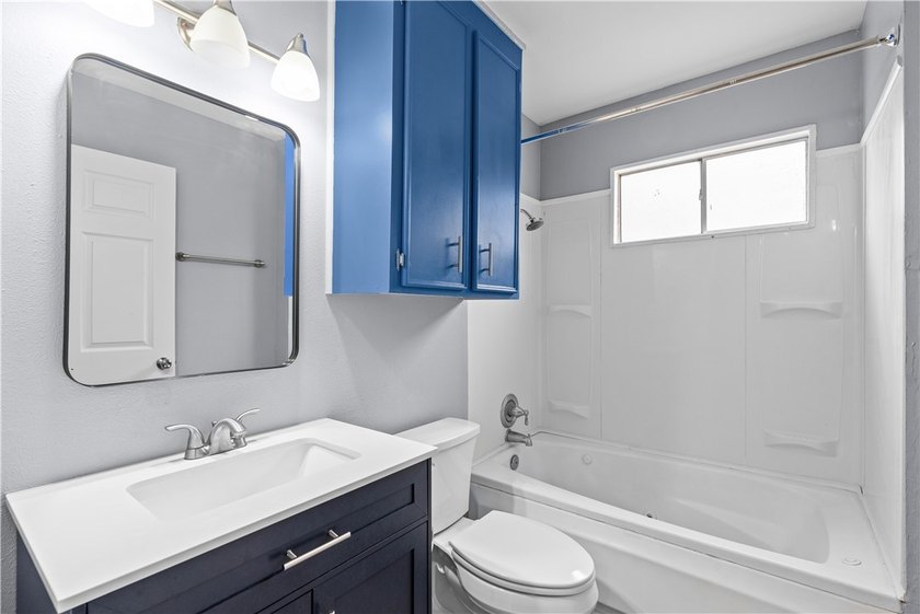 Welcome home to this beautifully remodeled 5-bedroom, 2 full - photo 12