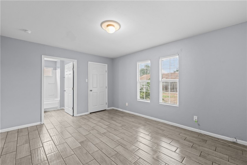 Welcome home to this beautifully remodeled 5-bedroom, 2 full - photo 14