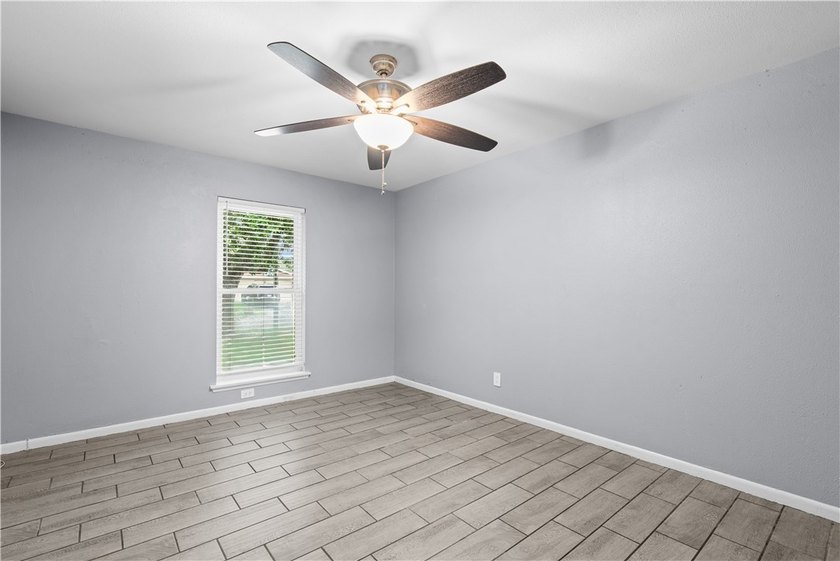 Welcome home to this beautifully remodeled 5-bedroom, 2 full - photo 17