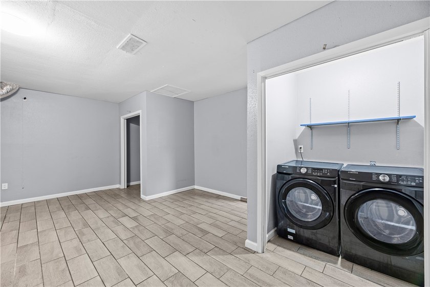 Welcome home to this beautifully remodeled 5-bedroom, 2 full - photo 18