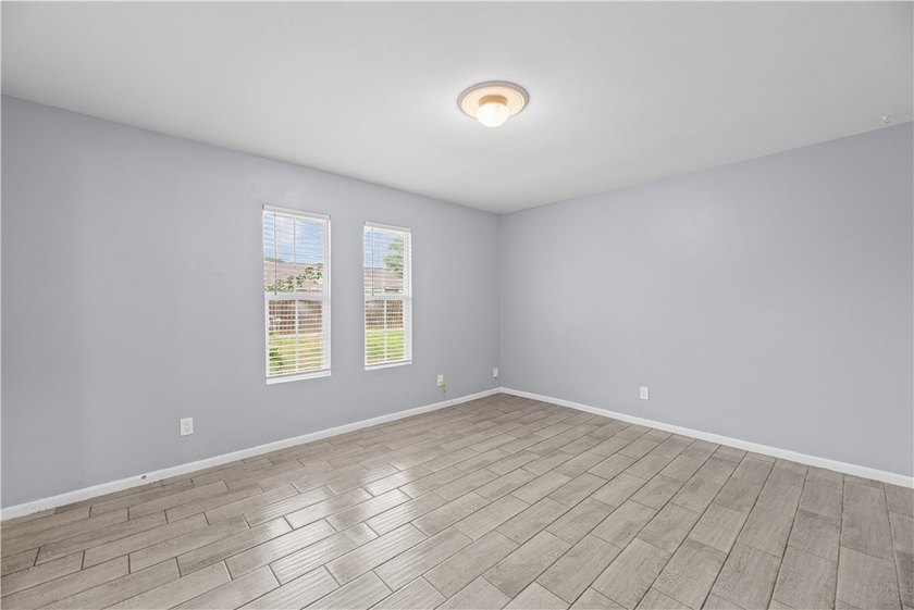 Welcome home to this beautifully remodeled 5-bedroom, 2 full - photo 21