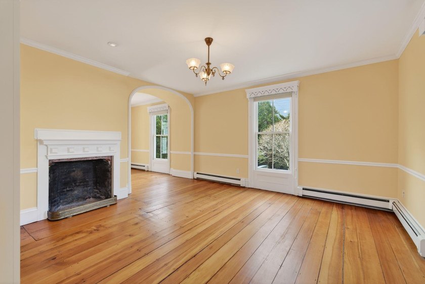 This beautiful 3,238 square foot c. 1832 Italianate sits in the - photo 9