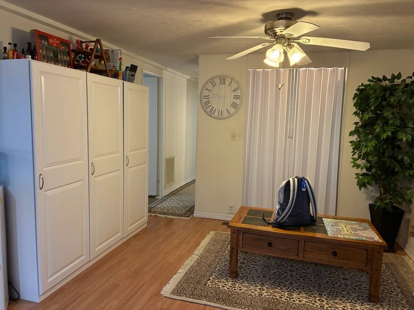 Beautifully maintained, partially furnished 2BR/2BA home located - photo 8