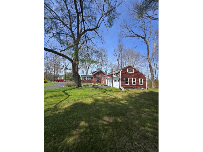 This unique cottage-style property in Falmouth, Maine, is a rare - photo 2