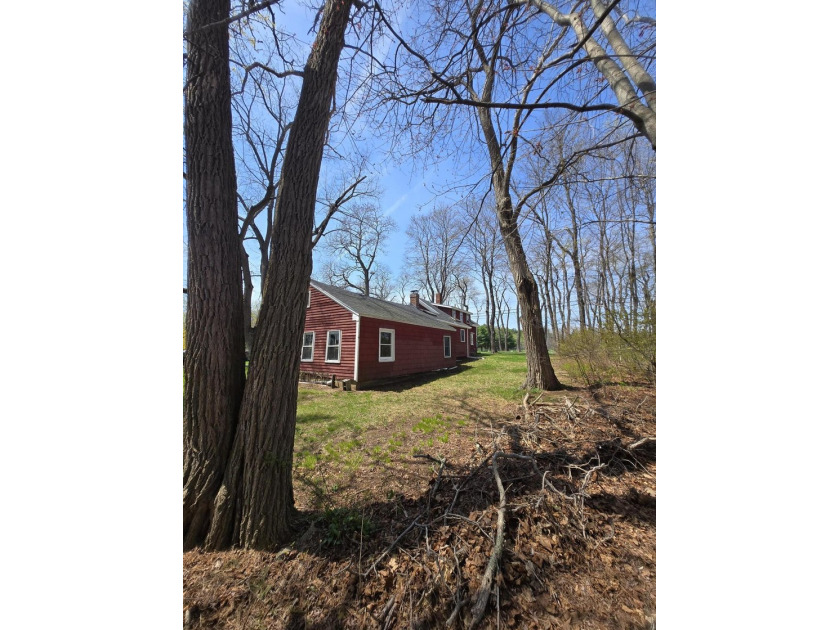 This unique cottage-style property in Falmouth, Maine, is a rare - photo 5