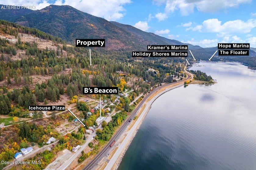 An exclusive estate property with panoramic lake views! This - photo 4