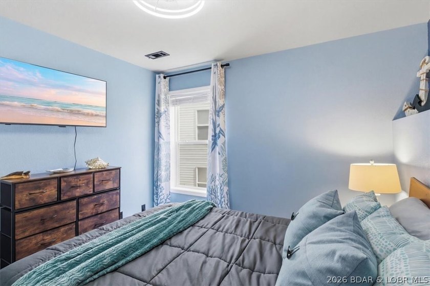 Enjoy the best of lake living in this beautifully renovated 3 - photo 15