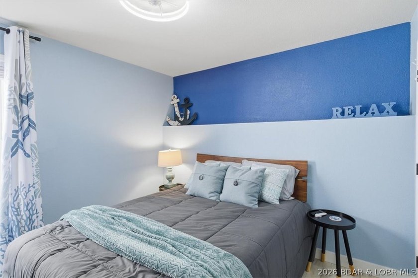 Enjoy the best of lake living in this beautifully renovated 3 - photo 16