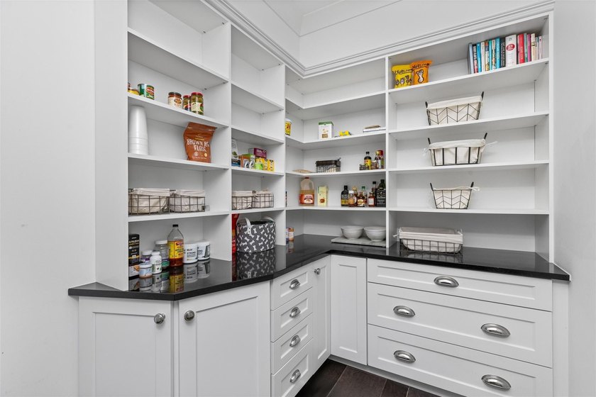 Experience the pinnacle of luxury living in this custom British - photo 24