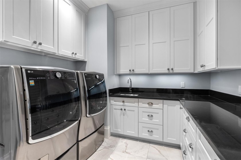 Experience the pinnacle of luxury living in this custom British - photo 25