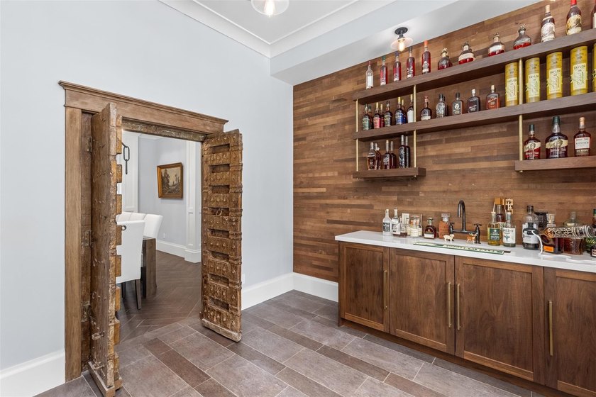 Experience the pinnacle of luxury living in this custom British - photo 29