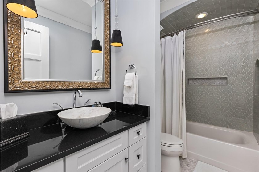 Experience the pinnacle of luxury living in this custom British - photo 45