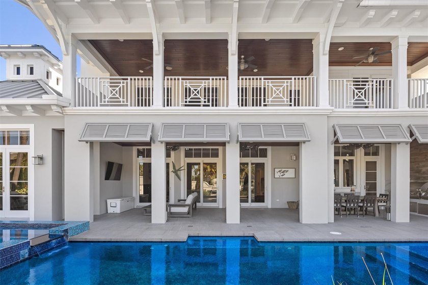 Experience the pinnacle of luxury living in this custom British - photo 54