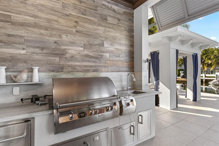 Experience the pinnacle of luxury living in this custom British - photo 59