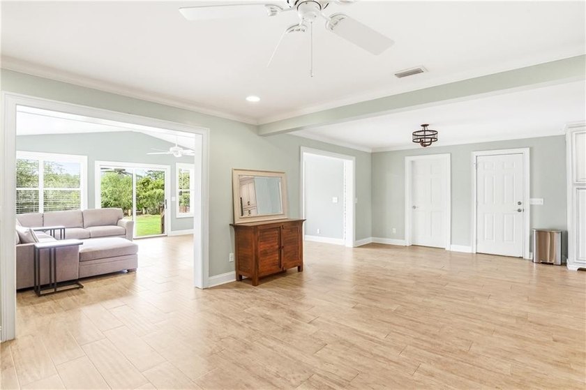 Experience the ultimate coastal lifestyle in this stunning - photo 10