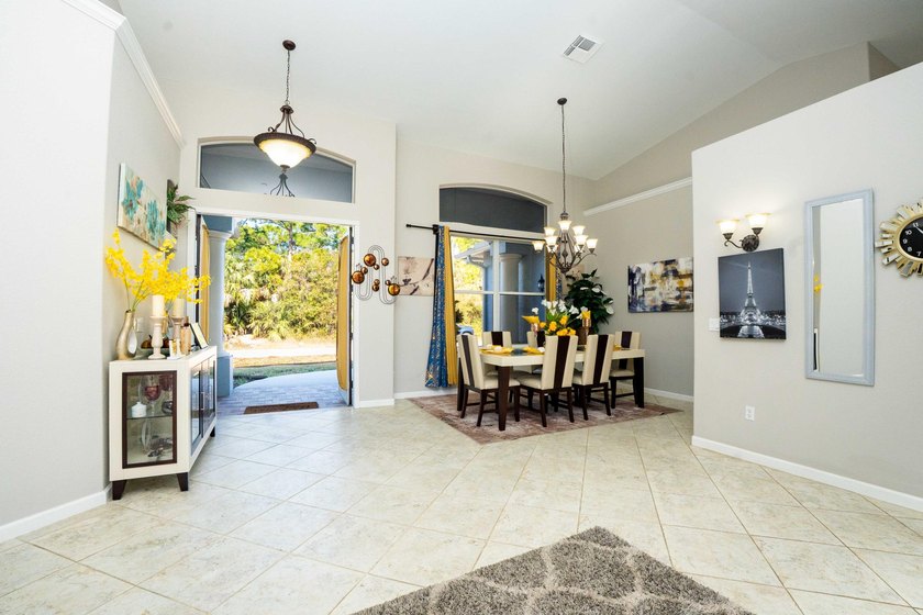 Step into this meticulously maintained 2006 CBS built home - photo 3