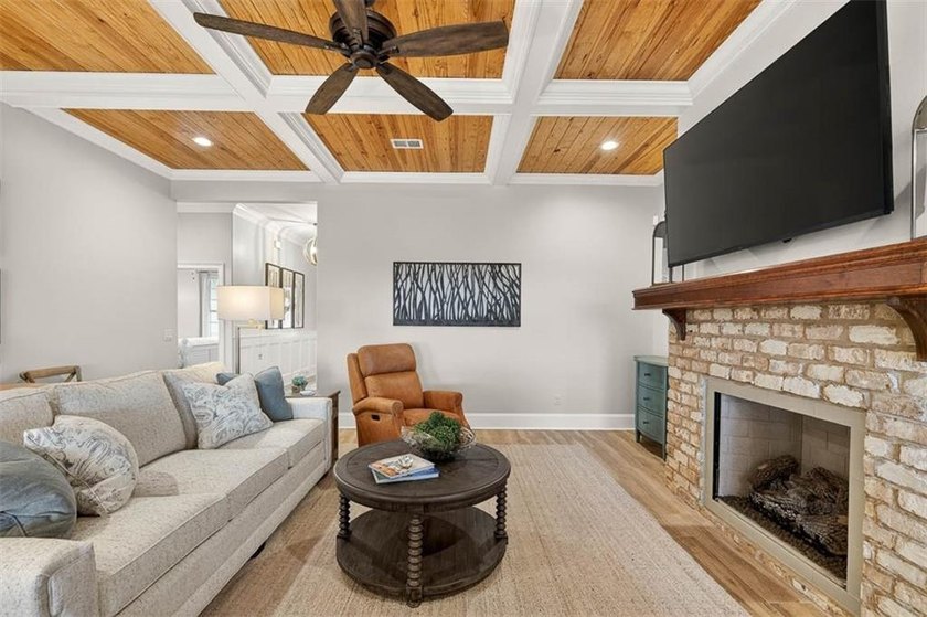 Welcome to a refined coastal sanctuary in the gated enclave of - photo 10