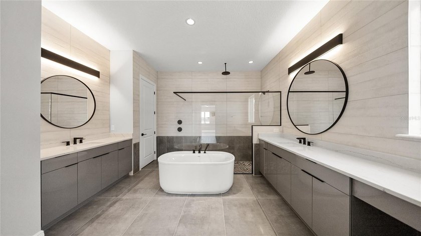 This never-lived-in luxury residence presents an extraordinary - photo 16