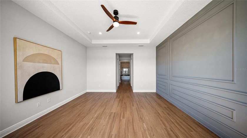 This never-lived-in luxury residence presents an extraordinary - photo 18