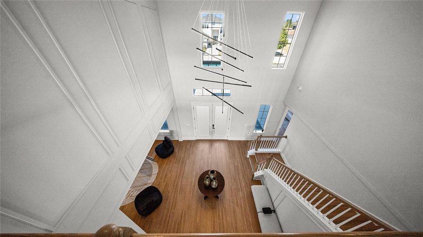 This never-lived-in luxury residence presents an extraordinary - photo 29
