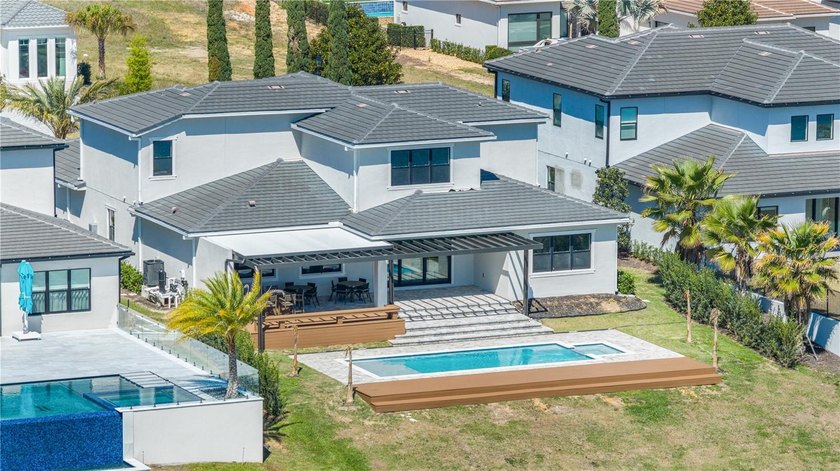 This never-lived-in luxury residence presents an extraordinary - photo 35