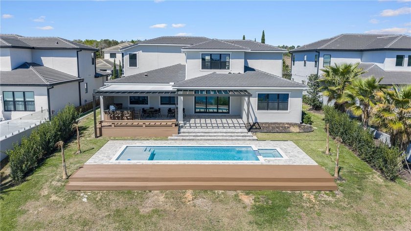 This never-lived-in luxury residence presents an extraordinary - photo 36