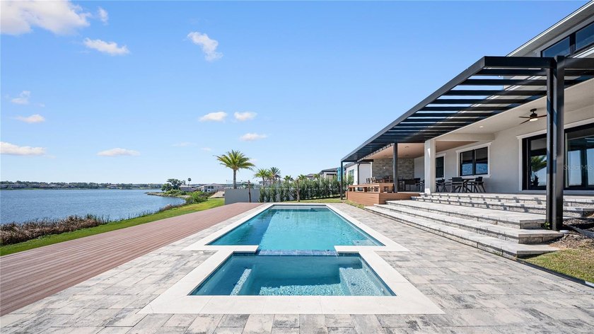 This never-lived-in luxury residence presents an extraordinary - photo 41