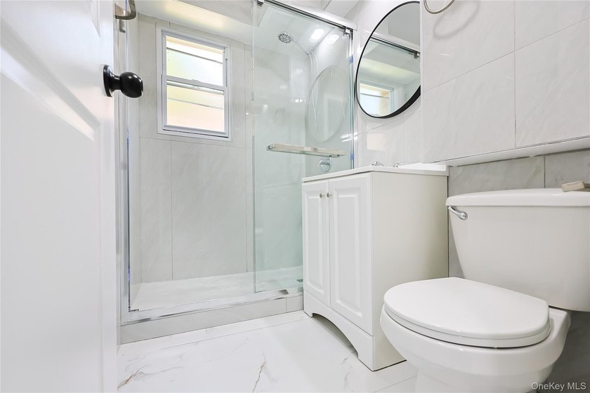 Welcome to this fully renovated 2-Family Condo Townhouse located - photo 15