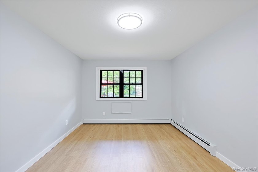 Welcome to this fully renovated 2-Family Condo Townhouse located - photo 19